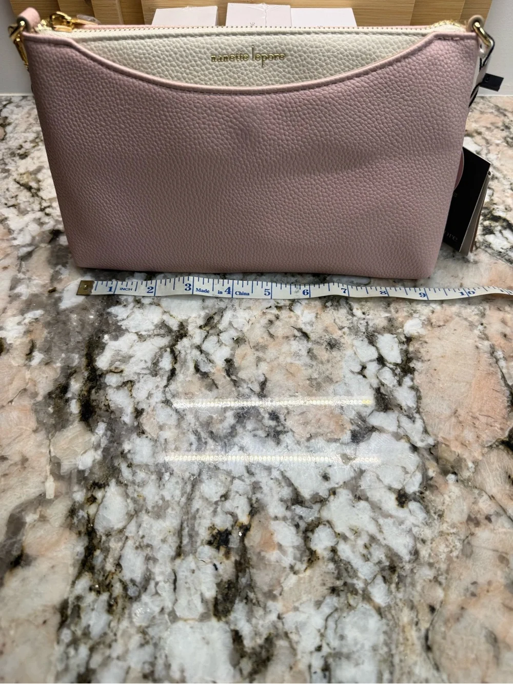 Nanette Lepore Pink and Cream Leather Wristlet with Removable Gold Cross Chain